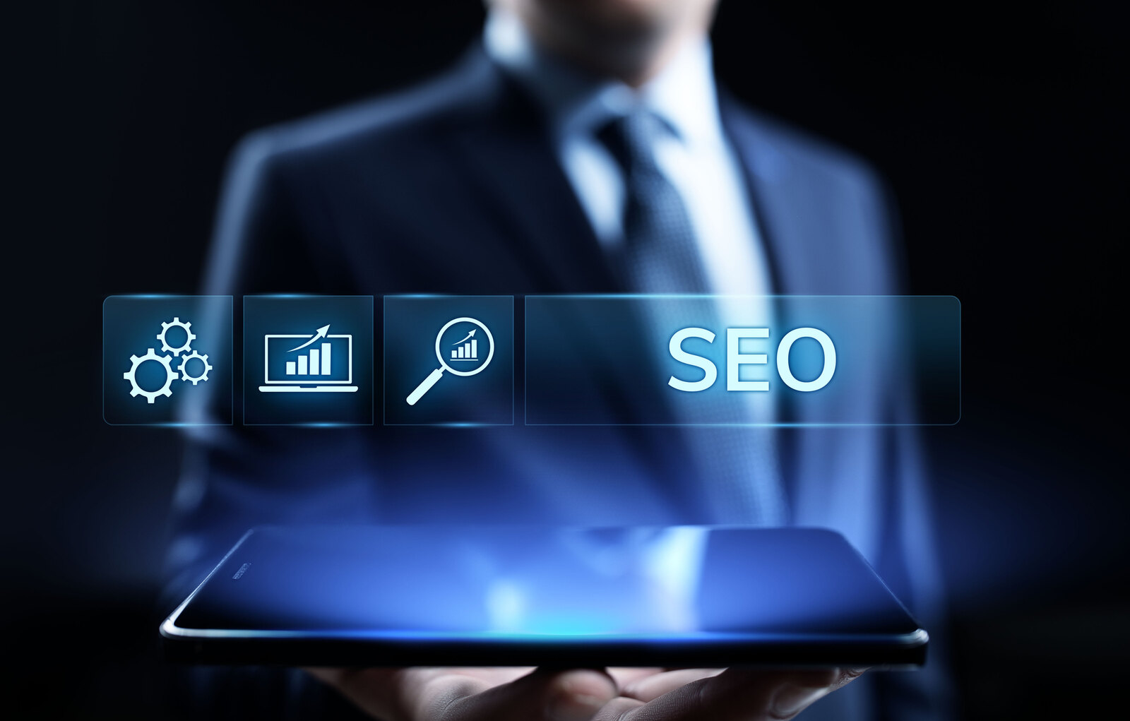 Lawyer holding a tablet beneath a glowing digital interface with analytics icons and the word “SEO.”