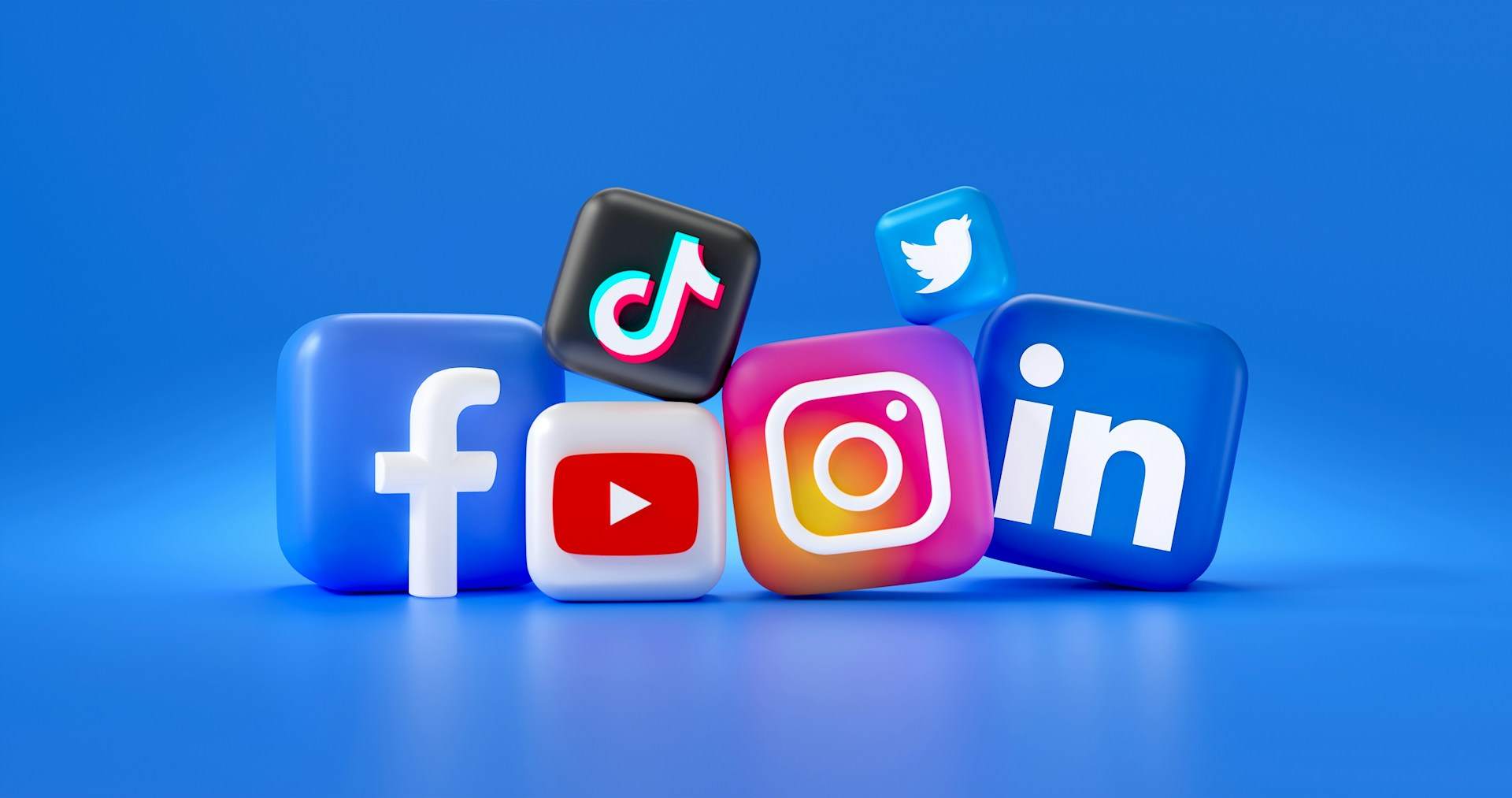 Close-up of a mobile phone screen displaying various social media icons