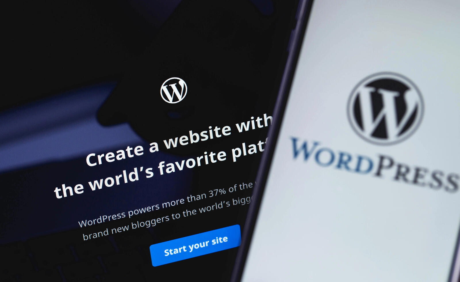WordPress homepage on both a desktop screen and mobile screen. The desktop screen says 'Create a website with the world's favorite platform'.
