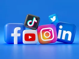 Close-up of a mobile phone screen displaying various social media icons