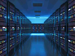 Rows of server rack hardware in the interior of a modern datacenter